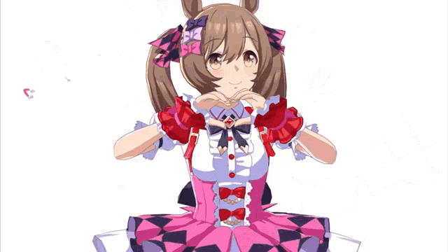 a girl with brown hair and red gloves is making a heart with her hands
