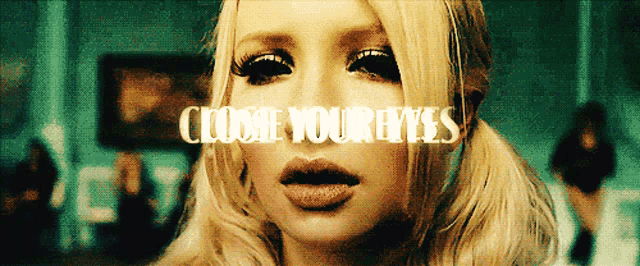 a close up of a woman 's face with the words " close your eyes " behind her