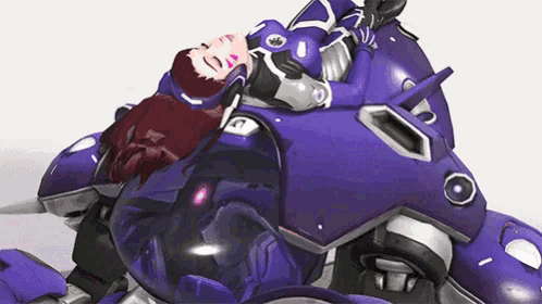 a woman in a purple suit is laying on top of a purple robot