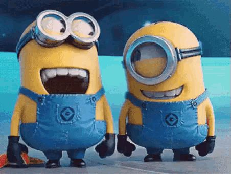 two minions are standing next to each other and one has his mouth open