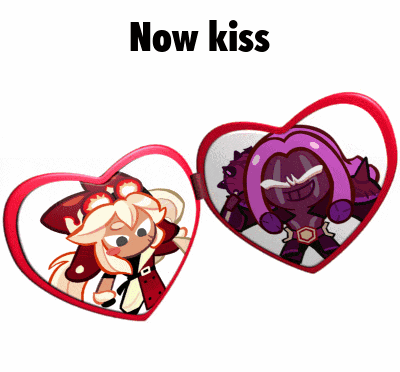 a couple of hearts with the words now kiss written on them