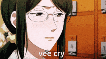 a woman wearing glasses is crying with the words vee cry written below her