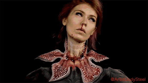 a woman with blood coming out of her nose has a flower made out of her neck