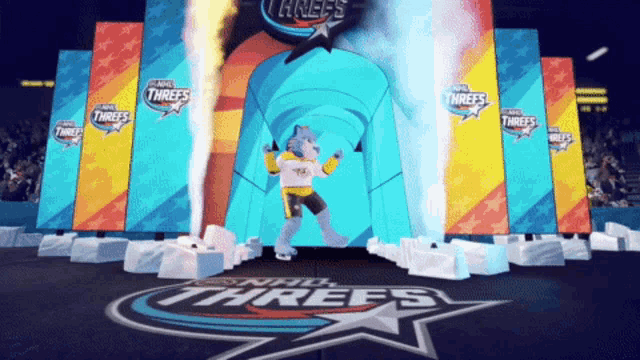 a mascot for the nhl threes is standing in front of a tunnel