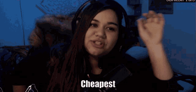 a woman wearing headphones says " okay cheapest "