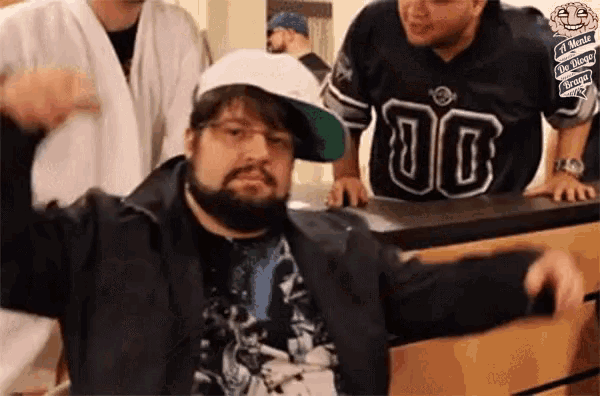 a man with a beard is wearing a hat and a jersey that says 00