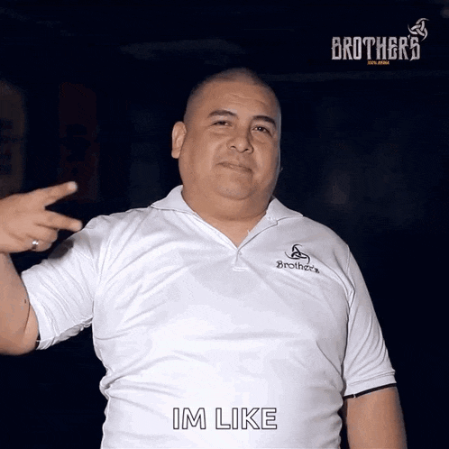 a man wearing a white shirt that says brothers on the front