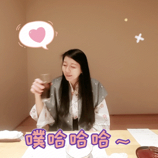 a woman sitting at a table with a glass of wine and a heart above her head