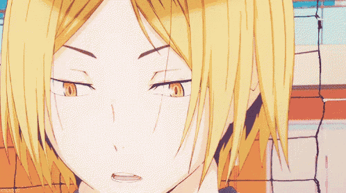 a close up of a person 's face with yellow hair