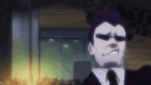 a man in a suit and tie is smoking a cigarette in front of a fire