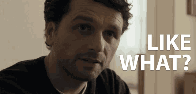 a man with a beard says like what in white letters