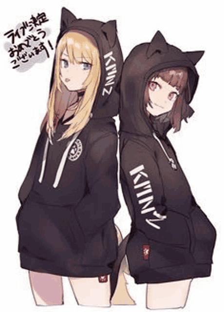 a couple of anime girls wearing hoodies with cat ears .