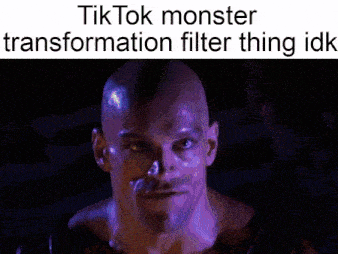 a picture of a dragon with a caption that says tik tok monster transformation filter thing idk