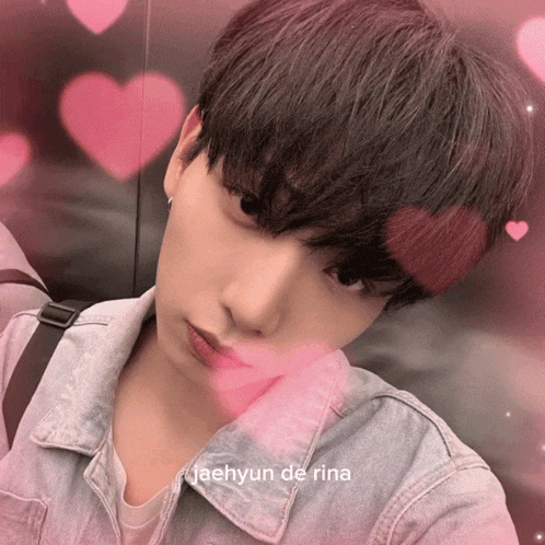 a close up of a person 's face with the name jaehyun de rina