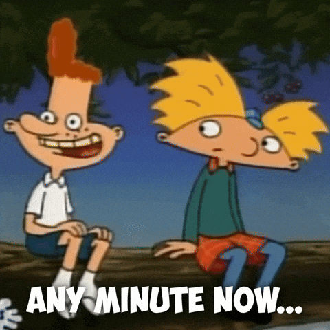 two cartoon characters sitting on a log with the words `` any minute now '' written on the bottom .
