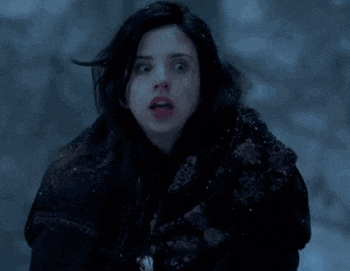 a woman says " not again " in front of a dark background