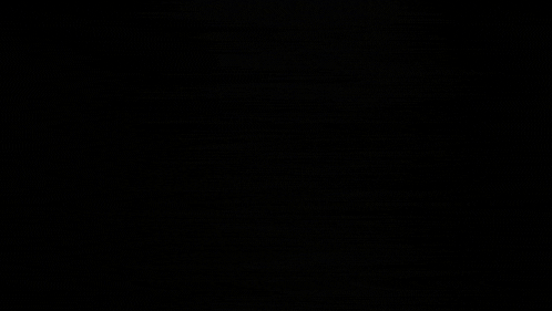 a black and white photo of a blurred image of a person 's face .