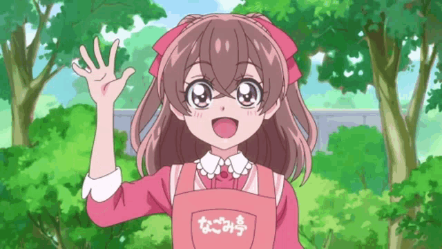a girl wearing a pink apron that says ' nozomi ' on it