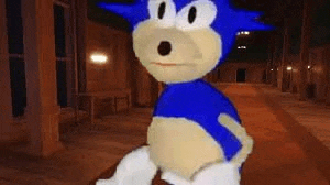 a stuffed sonic the hedgehog is standing in a hallway in a dark room .