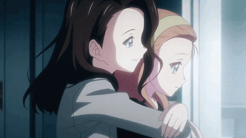 two anime girls are hugging each other in a room