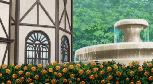 a fountain in front of a building that says naruto-base.co.