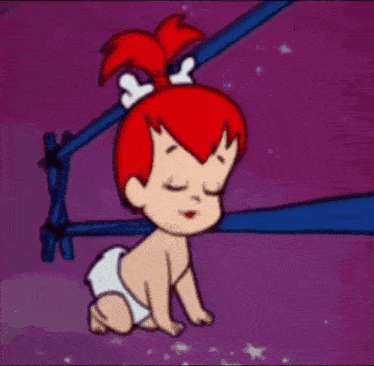 a baby in a diaper is crawling on the ground with the words goodnight written above it .
