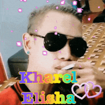 a man smoking a cigarette with the name kharel elisha on the bottom
