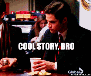 a man in a suit and tie sits at a table with a cup of coffee and the words cool story bro below him