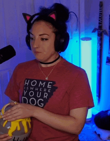 a woman wearing a shirt that says home is where your dog