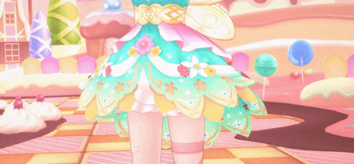 a girl in a fairy costume stands in front of a pink background