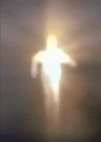 a blurred image of a person with a light coming out of it