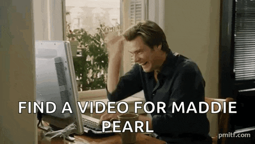 a man is sitting in front of a computer with the words find a video for maddie pearl written on the screen