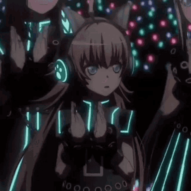 a girl with headphones on her head is standing in front of a crowd .