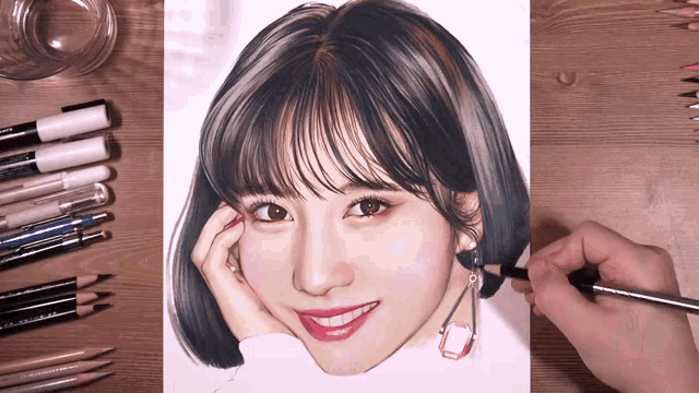 a person is drawing a woman 's face with a pencil that says ' prismacolor ' on it