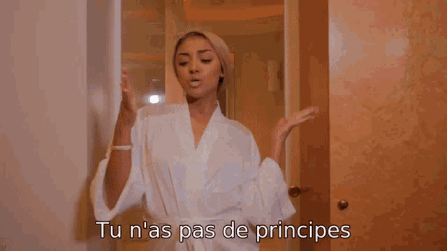 a woman in a bathrobe says tu n'as pas de principies