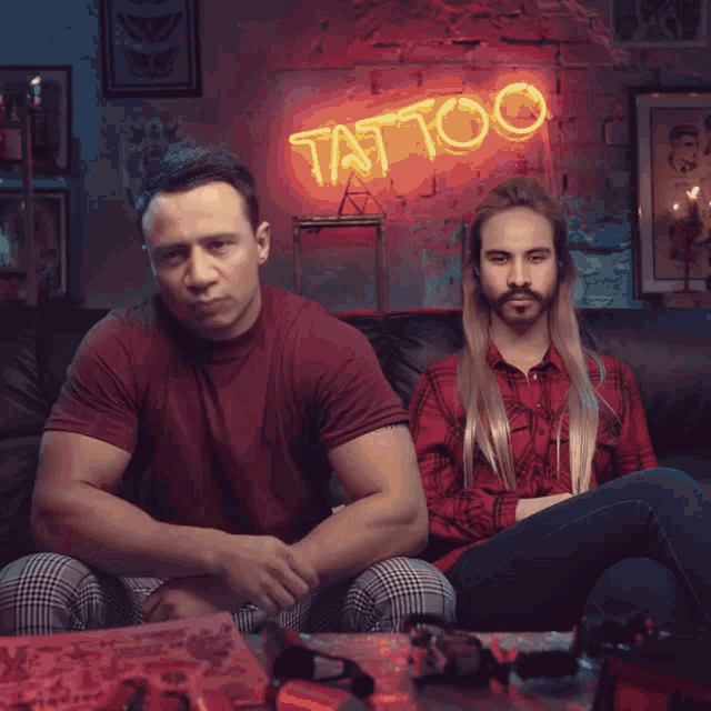 a man has a tattoo on his arm that says olivia emily