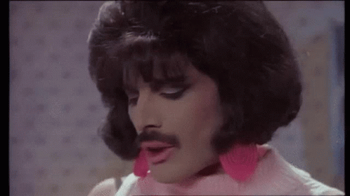 Freddie Mercury Dancing GIF - Freddie Mercury Dancing Wink GIFs
