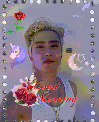 a man in a white tank top is surrounded by roses a unicorn and the words good morning