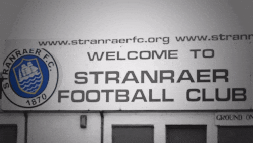 a sign that says " welcome to stranraer football club " on it