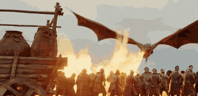 a dragon is flying over a crowd of people