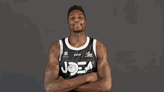 a basketball player wearing a black jersey with the number 0 on it