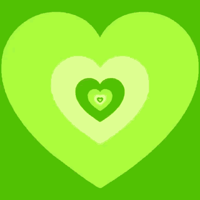 a green heart with three hearts inside of it on a green background