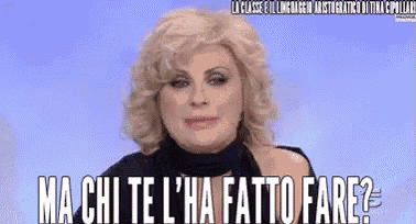a woman with blonde hair and a black scarf says ma chi te l ' ha fatto fare