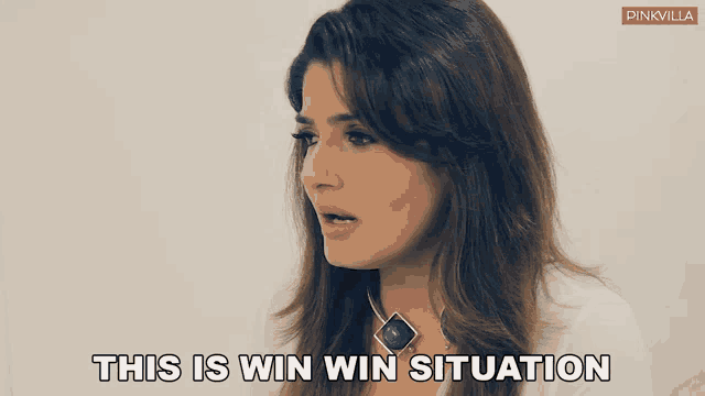 a woman says " this is win win situation " while wearing a necklace