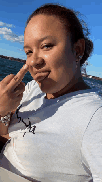 a woman wearing a t-shirt that says ' sofia ' on it