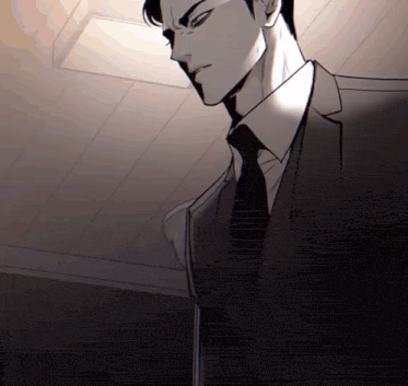 a man in a suit and tie is standing in the dark