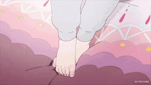 a cartoon drawing of a person 's feet on a bed