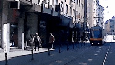 a drawing of people walking down a city street with a sign that says ' allianz ' on it