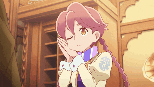 a girl with pink hair and a purple scarf has the letter gr on her sleeve