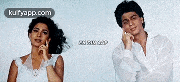 a man and a woman are standing next to each other in a movie poster for ek din aap .
